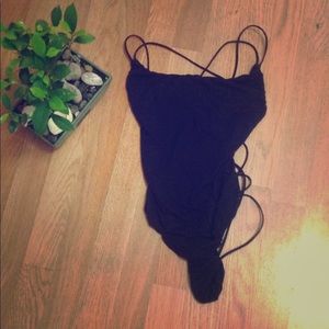 Strappy black bodysuit top